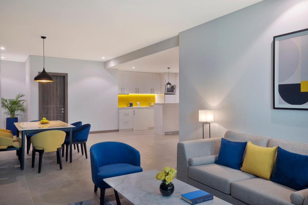 Voco Al Khobar By Ihg Hotel Exterior photo A living room at the hotel