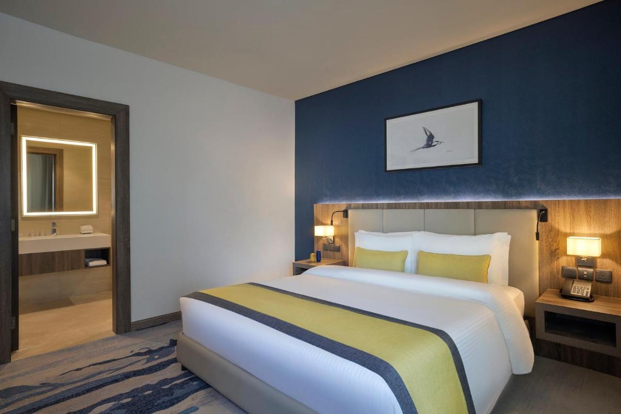 Voco Al Khobar By Ihg Hotel Exterior photo A bedroom at the hotel